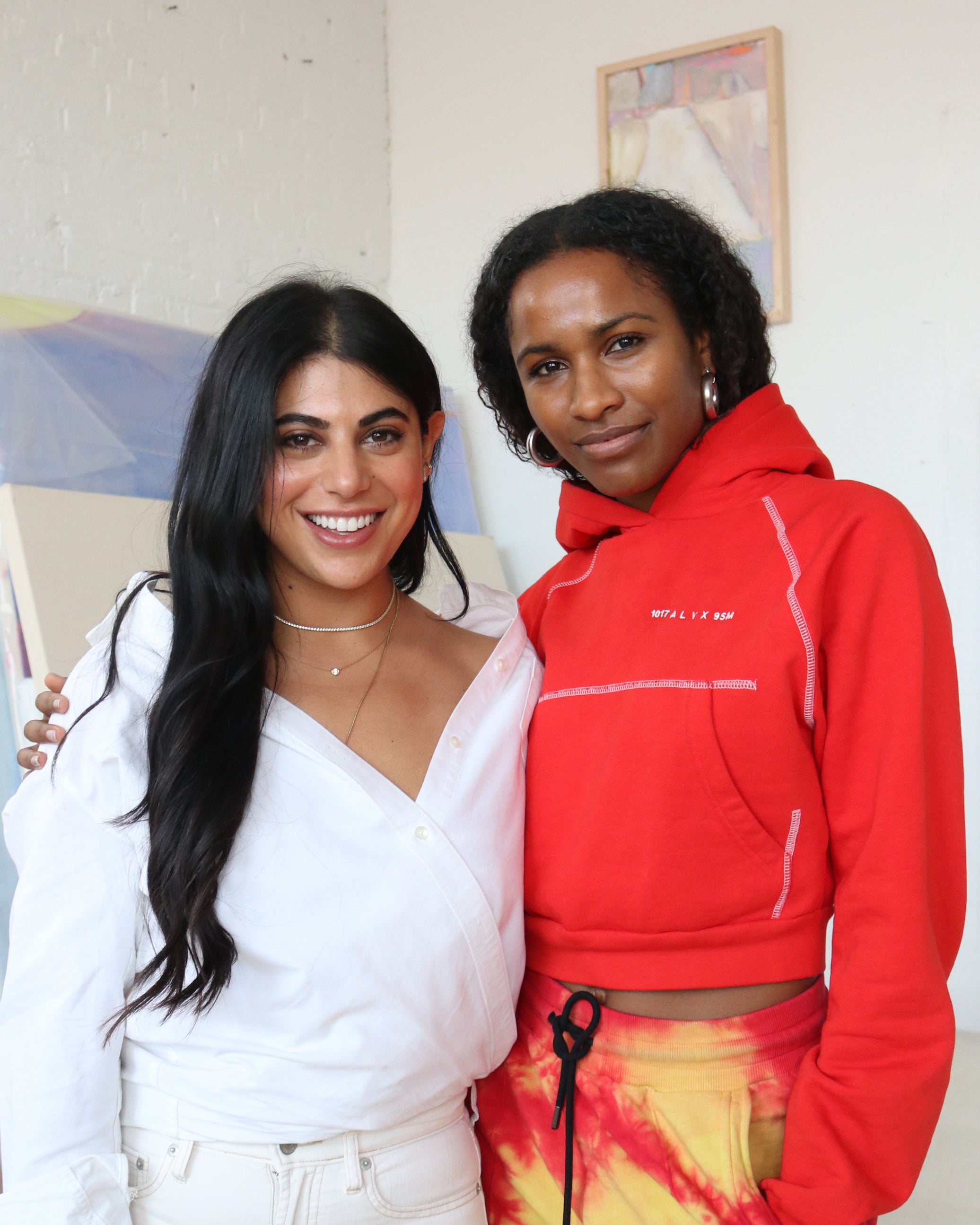 Two friends smiling, natural makeup